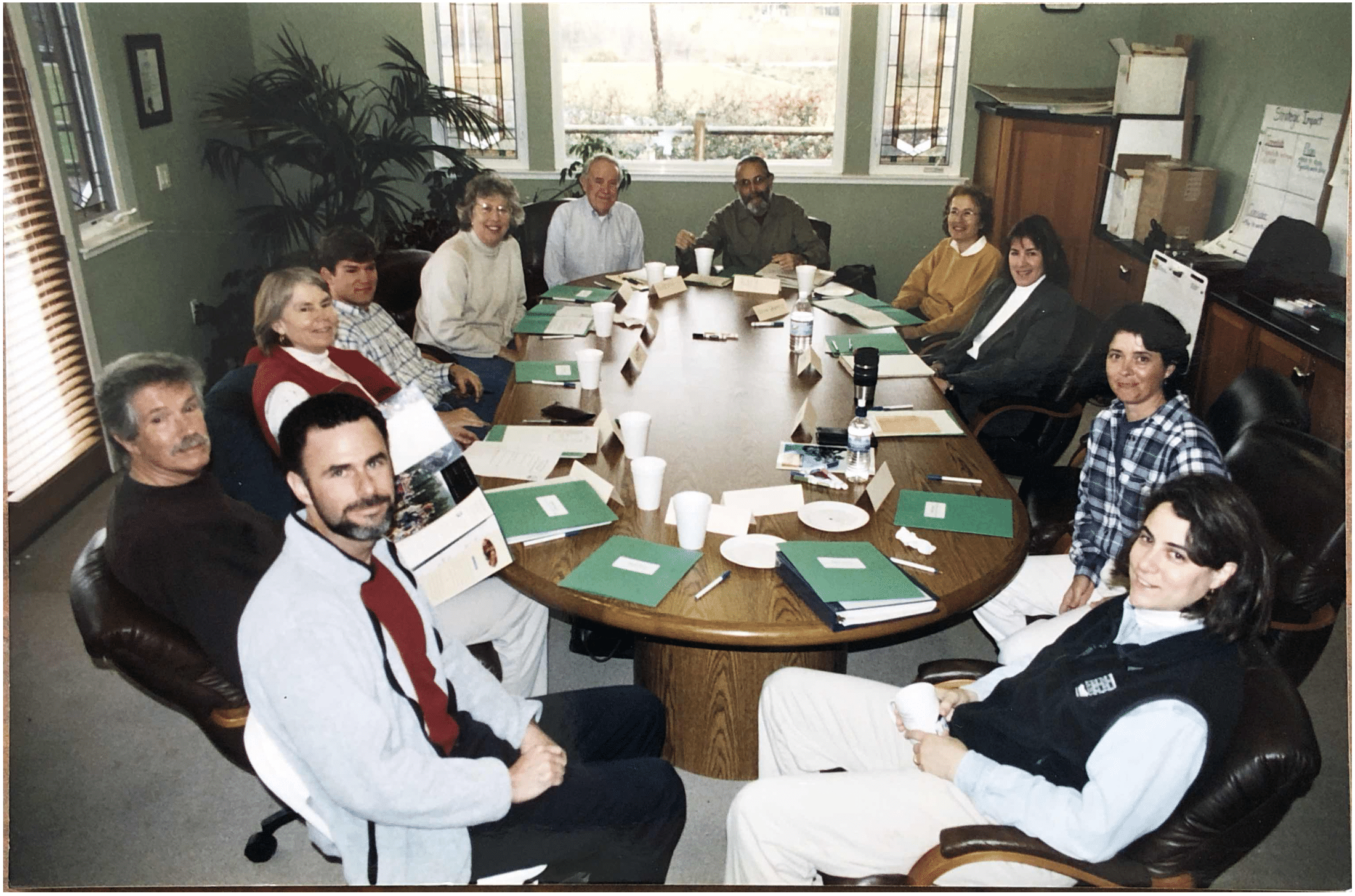 Tree Davis board members sit at a conference table.