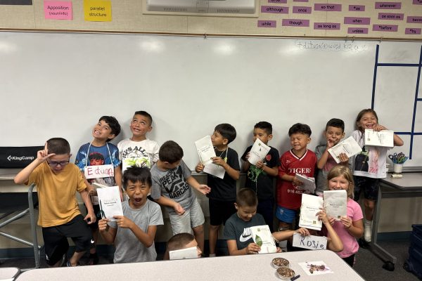 Students pose with nature journals.